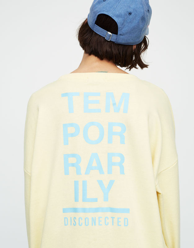Sweatshirt with slogan on back